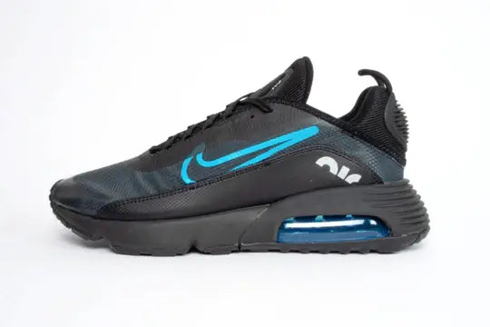 A pair of kid's Nike black trainers used to represent the junior shoe collection within the store.