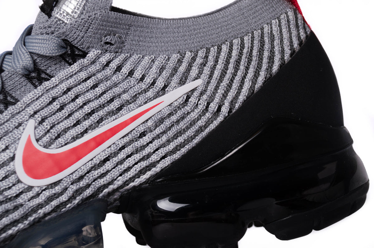 A close up angle of the Nike Air VaporMax Flyknit 3. Here you can see the precision-engineered flyknit material along with a close-up of the Nike Swoosh.